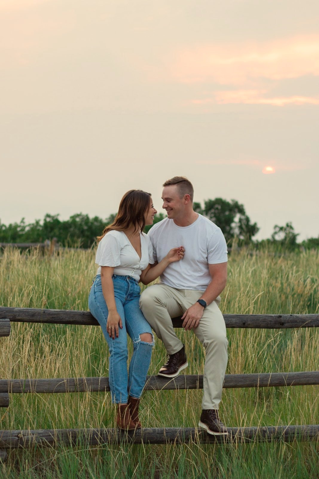 Couple at sunset in a field