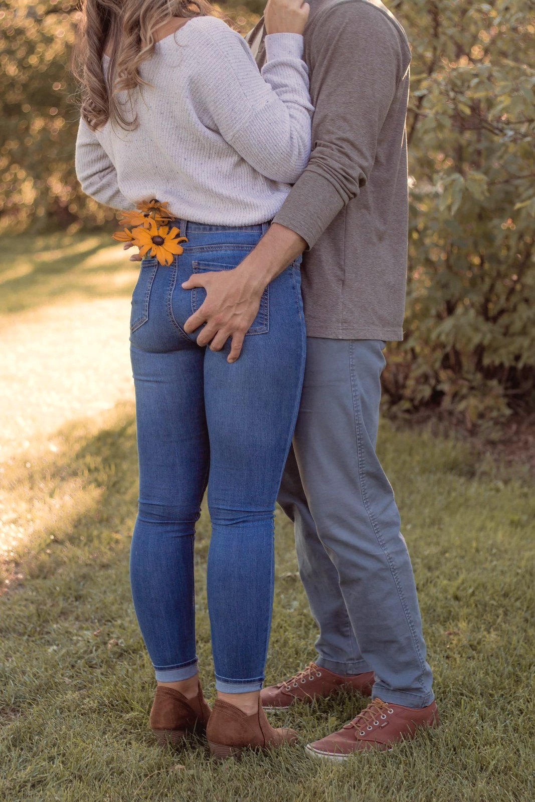 Couple embracing in a Denver park
