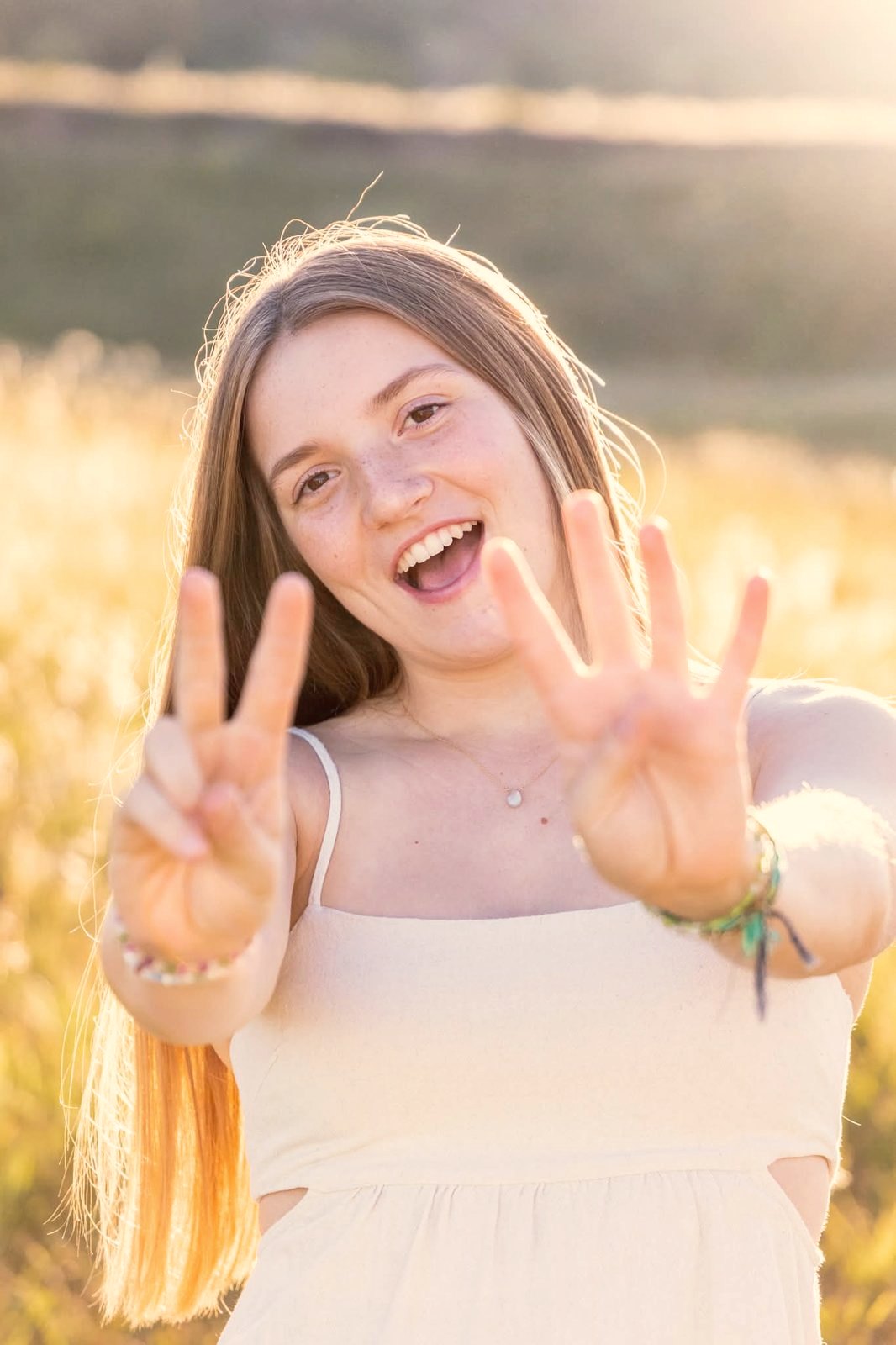 Senior portrait in a golden field