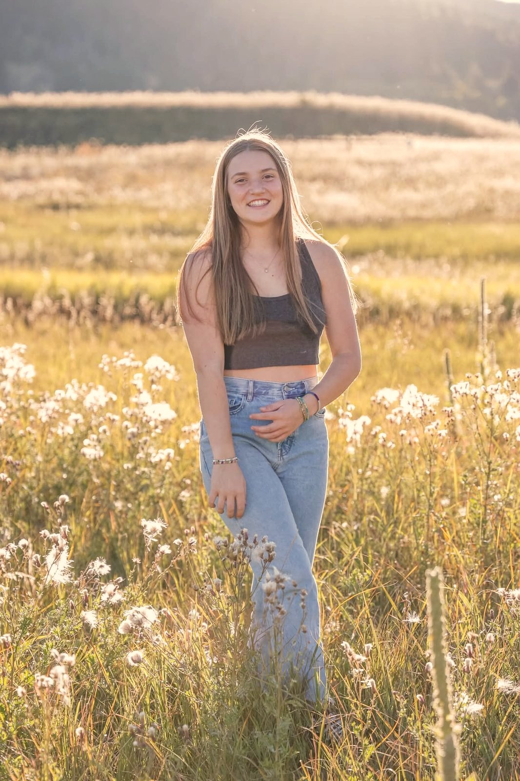 Senior portrait in a golden field