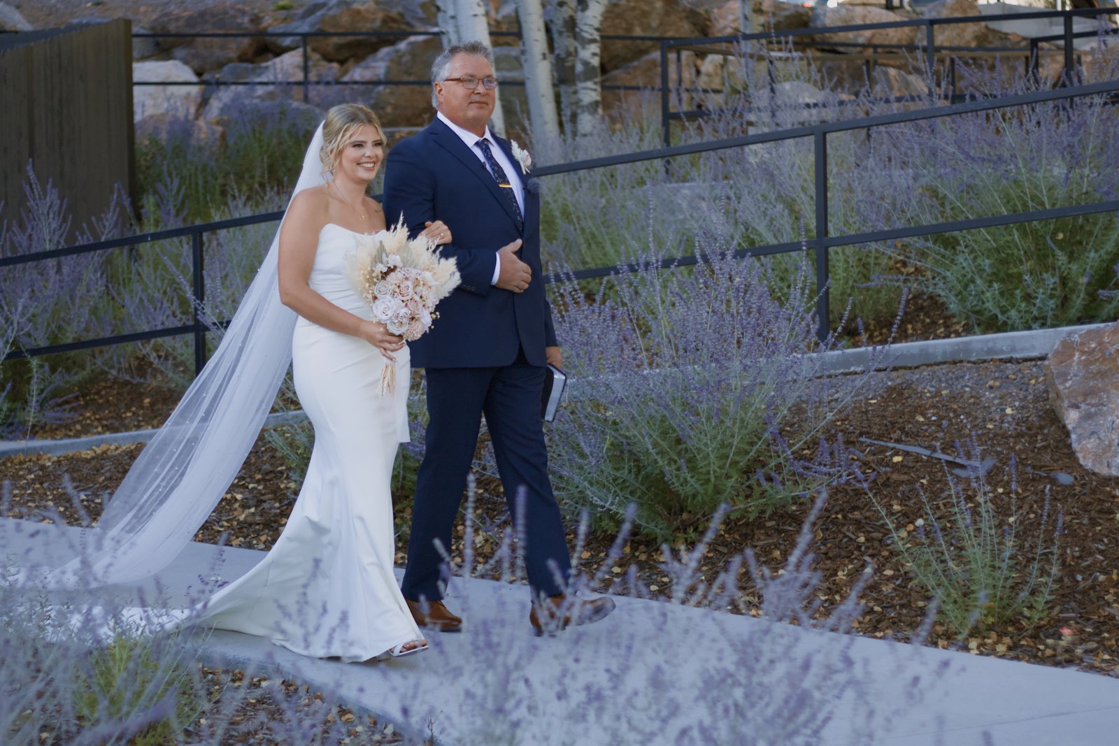 Father walking the bride down the aisle