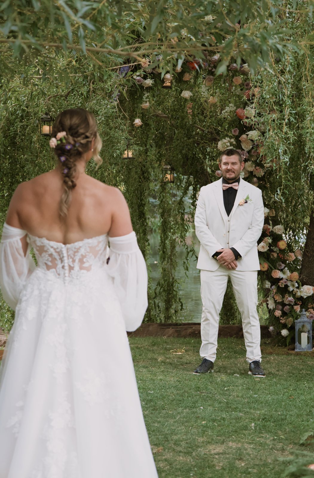 Bride walking toward the groom for the first look